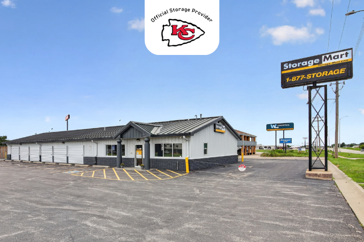 Exterior view of a StorageMart facility in Lincoln Nebraska with a Kansas City Chiefs logo at the top of the image